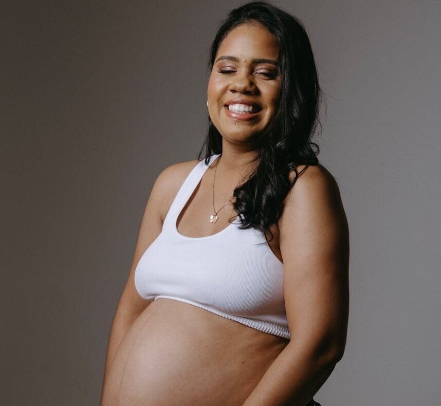 Pregnant woman using the Macha app